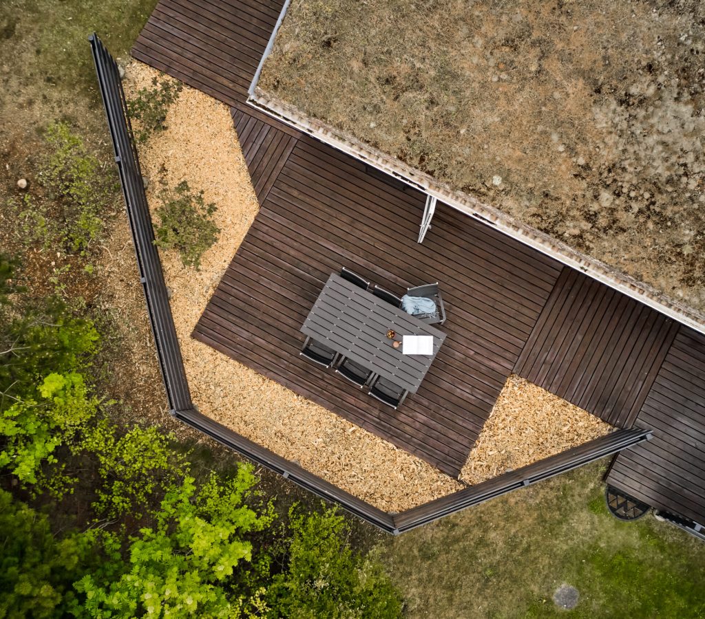 a drone shot of patio of house in denmark